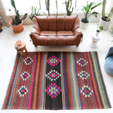 Vintage kilim rug in living room setting, bright colors, wild shaman, soft rug, bold color, Portland, Oregon, rug store, rug shop, local shop, vintage rug, modern kilim, warm colors