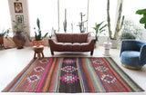 Vintage kilim rug in living room setting, bright colors, wild shaman, soft rug, bold color, Portland, Oregon, rug store, rug shop, local shop, vintage rug, modern kilim, warm colors