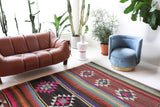 Vintage kilim rug in living room setting, bright colors, wild shaman, soft rug, bold color, Portland, Oregon, rug store, rug shop, local shop, vintage rug, modern kilim, warm colors