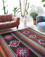 Vintage kilim rug in living room setting, bright colors, wild shaman, soft rug, bold color, Portland, Oregon, rug store, rug shop, local shop, vintage rug, modern kilim, warm colors