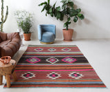 Vintage kilim rug in living room setting, bright colors, wild shaman, soft rug, bold color, Portland, Oregon, rug store, rug shop, local shop, vintage rug, modern kilim, warm colors