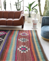 Vintage kilim rug in living room setting, bright colors, wild shaman, soft rug, bold color, Portland, Oregon, rug store, rug shop, local shop, vintage rug, modern kilim, warm colors