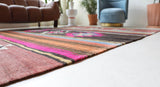 Vintage kilim rug in living room setting, bright colors, wild shaman, soft rug, bold color, Portland, Oregon, rug store, rug shop, local shop, vintage rug, modern kilim, warm colors