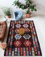 Vintage kilim rug in living room setting, bright colors, wild shaman, soft rug, bold color, Portland, Oregon, rug store, rug shop, local shop, vintage rug, modern kilim, warm colors
