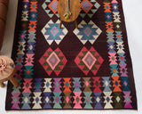 Vintage kilim rug in living room setting, bright colors, wild shaman, soft rug, bold color, Portland, Oregon, rug store, rug shop, local shop, vintage rug, modern kilim, warm colors