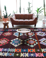 Vintage kilim rug in living room setting, bright colors, wild shaman, soft rug, bold color, Portland, Oregon, rug store, rug shop, local shop, vintage rug, modern kilim, warm colors