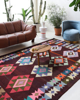 Vintage kilim rug in living room setting, bright colors, wild shaman, soft rug, bold color, Portland, Oregon, rug store, rug shop, local shop, vintage rug, modern kilim, warm colors
