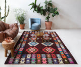 Vintage kilim rug in living room setting, bright colors, wild shaman, soft rug, bold color, Portland, Oregon, rug store, rug shop, local shop, vintage rug, modern kilim, warm colors