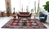 Vintage kilim rug in living room setting, bright colors, wild shaman, soft rug, bold color, Portland, Oregon, rug store, rug shop, local shop, vintage rug, modern kilim, warm colors