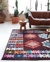 Vintage kilim rug in living room setting, bright colors, wild shaman, soft rug, bold color, Portland, Oregon, rug store, rug shop, local shop, vintage rug, modern kilim, warm colors