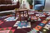 Vintage kilim rug in living room setting, bright colors, wild shaman, soft rug, bold color, Portland, Oregon, rug store, rug shop, local shop, vintage rug, modern kilim, warm colors