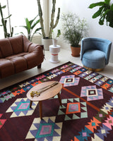 Vintage kilim rug in living room setting, bright colors, wild shaman, soft rug, bold color, Portland, Oregon, rug store, rug shop, local shop, vintage rug, modern kilim, warm colors