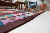Vintage kilim rug in living room setting, bright colors, wild shaman, soft rug, bold color, Portland, Oregon, rug store, rug shop, local shop, vintage rug, modern kilim, warm colors