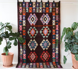 Vintage kilim rug in living room setting, bright colors, wild shaman, soft rug, bold color, Portland, Oregon, rug store, rug shop, local shop, vintage rug, modern kilim, warm colors