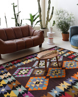 Vintage kilim rug in living room setting, bright colors, wild shaman, soft rug, bold color, Portland, Oregon, rug store, rug shop, local shop, vintage rug, modern kilim, warm colors