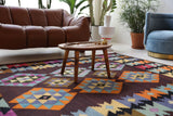 Vintage kilim rug in living room setting, bright colors, wild shaman, soft rug, bold color, Portland, Oregon, rug store, rug shop, local shop, vintage rug, modern kilim, warm colors