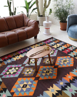 Vintage kilim rug in living room setting, bright colors, wild shaman, soft rug, bold color, Portland, Oregon, rug store, rug shop, local shop, vintage rug, modern kilim, warm colors