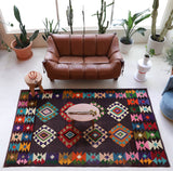 Vintage kilim rug in living room setting, bright colors, wild shaman, soft rug, bold color, Portland, Oregon, rug store, rug shop, local shop, vintage rug, modern kilim, warm colors