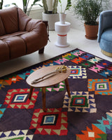 Vintage kilim rug in living room setting, bright colors, wild shaman, soft rug, bold color, Portland, Oregon, rug store, rug shop, local shop, vintage rug, modern kilim, warm colors