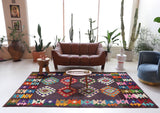 Vintage kilim rug in living room setting, bright colors, wild shaman, soft rug, bold color, Portland, Oregon, rug store, rug shop, local shop, vintage rug, modern kilim, warm colors