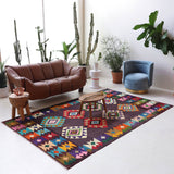 Vintage kilim rug in living room setting, bright colors, wild shaman, soft rug, bold color, Portland, Oregon, rug store, rug shop, local shop, vintage rug, modern kilim, warm colors