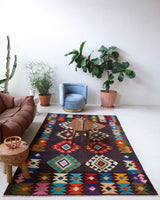 Vintage kilim rug in living room setting, bright colors, wild shaman, soft rug, bold color, Portland, Oregon, rug store, rug shop, local shop, vintage rug, modern kilim, warm colors