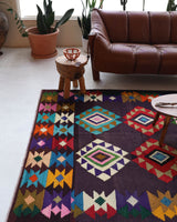 Vintage kilim rug in living room setting, bright colors, wild shaman, soft rug, bold color, Portland, Oregon, rug store, rug shop, local shop, vintage rug, modern kilim, warm colors