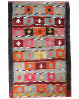 Vintage kilim rug in living room setting, bright colors, wild shaman, soft rug, bold color, Portland, Oregon, rug store, rug shop, local shop, vintage rug, modern kilim, warm colors