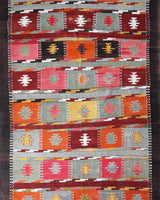 Vintage kilim rug in living room setting, bright colors, wild shaman, soft rug, bold color, Portland, Oregon, rug store, rug shop, local shop, vintage rug, modern kilim, warm colors