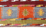 Vintage kilim rug in living room setting, bright colors, wild shaman, soft rug, bold color, Portland, Oregon, rug store, rug shop, local shop, vintage rug, modern kilim, warm colors