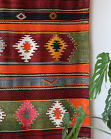 Vintage kilim rug in living room setting, bright colors, wild shaman, soft rug, bold color, Portland, Oregon, rug store, rug shop, local shop, vintage rug, modern kilim, warm colors