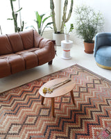 Vintage kilim rug in living room setting, old rug, antique rug, pastel colors, faded colors, Turkish rug, vintage rug, soft rug, Portland, Oregon, rug store, rug shop, local shop, earthy tones, earthy colors, warm colors