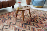 Vintage kilim rug in living room setting, old rug, antique rug, pastel colors, faded colors, Turkish rug, vintage rug, soft rug, Portland, Oregon, rug store, rug shop, local shop, earthy tones, earthy colors, warm colors