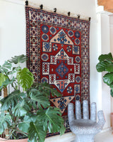 Vintage Turkish rug in a living room setting, pile rug, Turkish rug, vintage rug, portland, rug shop, bright colors, wild shaman, soft rug, bold color, Portland, Oregon, rug store, rug shop, local shop, antique rug