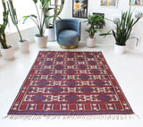 Vintage kilim rug in room decor setting, old rug, antique rug, pastel colors, faded colors, Turkish rug, vintage rug, soft rug, Portland, Oregon, rug store, rug shop, local shop, bold colors, bright colors, faded colors