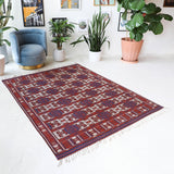 Vintage kilim rug in room decor setting, old rug, antique rug, pastel colors, faded colors, Turkish rug, vintage rug, soft rug, Portland, Oregon, rug store, rug shop, local shop, bold colors, bright colors, faded colors