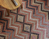 Vintage kilim rug in living room setting, old rug, antique rug, pastel colors, faded colors, Turkish rug, vintage rug, soft rug, Portland, Oregon, rug store, rug shop, local shop, earthy tones, earthy colors, warm colors