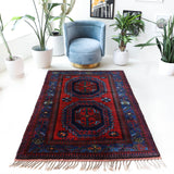Vintage Turkish rug in a living room setting, pile rug, Turkish rug, vintage rug, portland, rug shop, bright colors, wild shaman, soft rug, bold color, Portland, Oregon, rug store, rug shop, local shop, antique rug