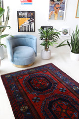 Vintage Turkish rug in a living room setting, pile rug, Turkish rug, vintage rug, portland, rug shop, bright colors, wild shaman, soft rug, bold color, Portland, Oregon, rug store, rug shop, local shop, antique rug