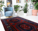 Vintage Turkish rug in a living room setting, pile rug, Turkish rug, vintage rug, portland, rug shop, bright colors, wild shaman, soft rug, bold color, Portland, Oregon, rug store, rug shop, local shop, antique rug