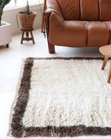 Vintage Turkish rug in a living room setting, pile rug, Turkish rug, vintage rug, portland, rug shop, bright colors, wild shaman, soft rug, bold color, Portland, Oregon, rug store, rug shop, local shop, shag rug, shaggy, plush,tulu rugs