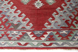 Vintage kilim rug in room decor setting, old rug, antique rug, pastel colors, faded colors, Turkish rug, vintage rug, soft rug, Portland, Oregon, rug store, rug shop, local shop, bold colors, bright colors, faded colors