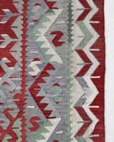 Vintage kilim rug in room decor setting, old rug, antique rug, pastel colors, faded colors, Turkish rug, vintage rug, soft rug, Portland, Oregon, rug store, rug shop, local shop, bold colors, bright colors, faded colors