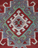 Vintage kilim rug in room decor setting, old rug, antique rug, pastel colors, faded colors, Turkish rug, vintage rug, soft rug, Portland, Oregon, rug store, rug shop, local shop, bold colors, bright colors, faded colors