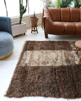 Vintage Turkish rug in a living room setting, pile rug, Turkish rug, vintage rug, portland, rug shop, bright colors, wild shaman, soft rug, bold color, Portland, Oregon, rug store, rug shop, local shop, shag rug, shaggy, plush,tulu rugs