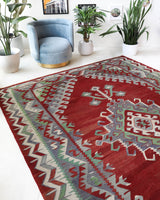 Vintage kilim rug in room decor setting, old rug, antique rug, pastel colors, faded colors, Turkish rug, vintage rug, soft rug, Portland, Oregon, rug store, rug shop, local shop, bold colors, bright colors, faded colors