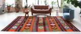 Vintage kilim rug in living room setting, bright colors, wild shaman, soft rug, bold color, Portland, Oregon, rug store, rug shop, local shop, vintage rug, modern kilim, warm colors