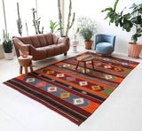 Vintage kilim rug in living room setting, bright colors, wild shaman, soft rug, bold color, Portland, Oregon, rug store, rug shop, local shop, vintage rug, modern kilim, warm colors