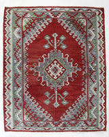 Vintage kilim rug in room decor setting, old rug, antique rug, pastel colors, faded colors, Turkish rug, vintage rug, soft rug, Portland, Oregon, rug store, rug shop, local shop, bold colors, bright colors, faded colors