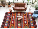 Vintage kilim rug in living room setting, bright colors, wild shaman, soft rug, bold color, Portland, Oregon, rug store, rug shop, local shop, vintage rug, modern kilim, warm colors